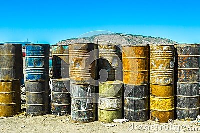 Image of old oil barrels in piles Stock Photo