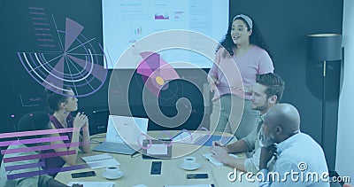 Image of multiple graphs moving over diverse businessman explaining report to colleagues Stock Photo