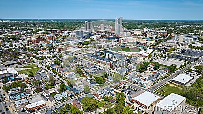 Neighborhood aerial downtown Fort Wayne houses, businesses, Parkview Field, condos and skyscrapers Stock Photo