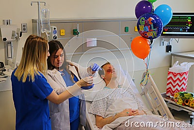 Image of nurse drawing medicine for patient Stock Photo