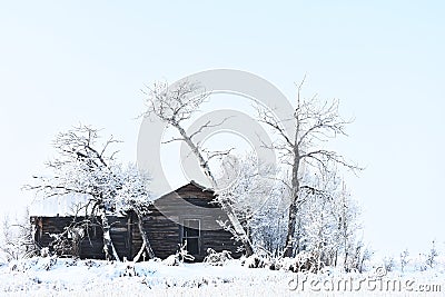 Run Down Farm House In Winter. Stock Photo