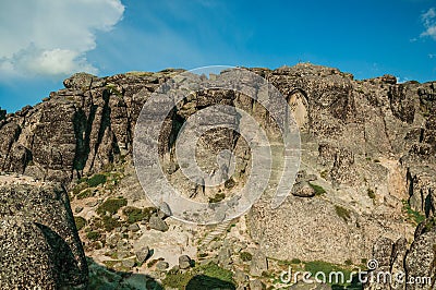 Image of Our Lady of the Good Star carved in a rocky cliff Stock Photo