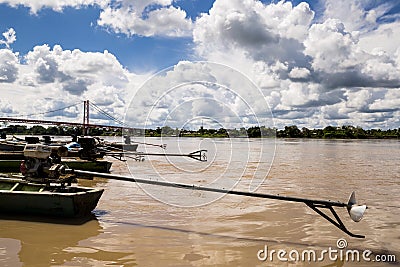 Image in Peruvian jungle of a boat in a river in Amazon forest. Traditional way of transportation in tropical rivers Editorial Stock Photo