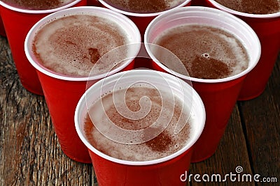 Red Plastic Drinking Cups Filled With Beer Stock Photo