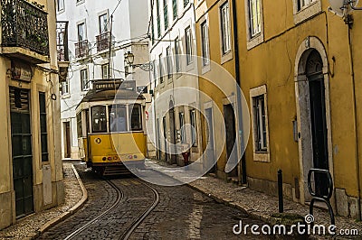 An image of retro tram in narrow street of Lisbon,Portugal. Editorial Stock Photo