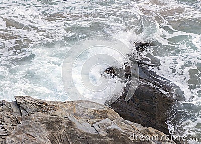 Rock in the water washed by sea water Stock Photo