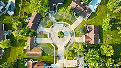 Roof view of cul-de-sac houses in low to middleclass neighborhood with landscaping aerial Stock Photo