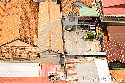 Image of roofs in Phnom Penh. Diferent types of house. Stock Photo