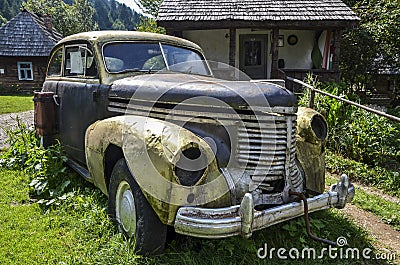 Image of rusted abandoned an old broken car Editorial Stock Photo