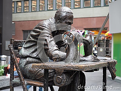 Image of the sculpture The Garment Worker in New York. Editorial Stock Photo