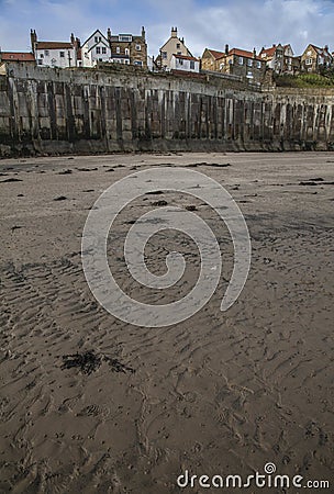 Robin Hood`s Bay, the beach, houses and the sky. Stock Photo