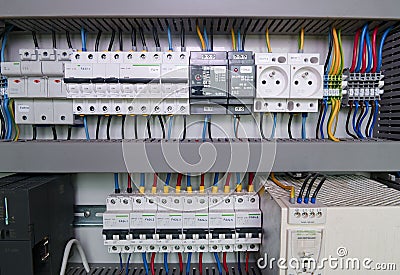 Image shows control cubicle. Electric device and circuit breakers inside power case Stock Photo