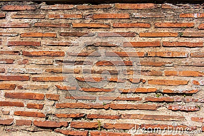 Weathered medieval stone wall abstract texture background Stock Photo