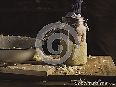 Pounding sauerkraut Stock Photo