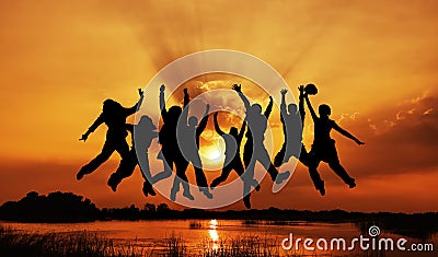 Image of silhouettes group jumping Stock Photo