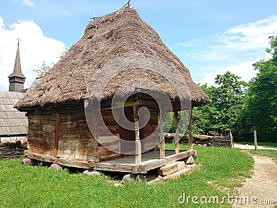 Image of simple cottage with straw roof Stock Photo