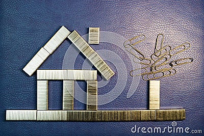 Image of a small house of stationery on eco-leather, the house is schematically depicted Stock Photo