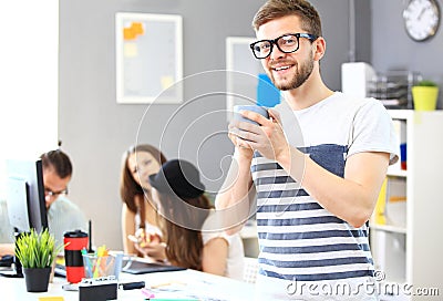 Image of smart young businessmen looking at camera Stock Photo