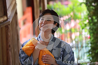 A smiling woman in a yukata Stock Photo