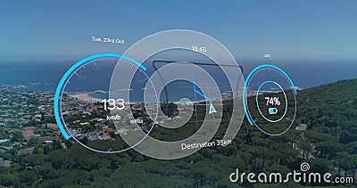 Image of speedometer, gps and charge data on electric vehicle interface, over coastal view Stock Photo