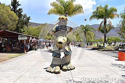 Image of a statue of a giant fisherman on the boardwalk of Jocotepec Editorial Stock Photo