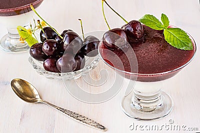 Superbly cooked panna cotta with cherry jelly in glasses Stock Photo