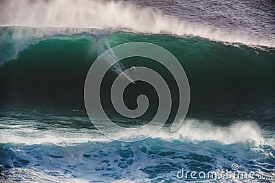 Image Surfer on Blue Ocean Big Mavericks Wave in California Stock Photo