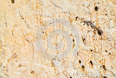 Texture of rock up close yellow with veins of dark gold Stock Photo