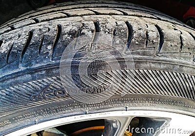 Tyre damage, Sidewall bulge or bump in a car Tyre, car repair, Tyre repair. Editorial Stock Photo