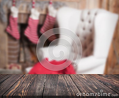 Image of wooden table in front of christmas blurred background o Stock Photo