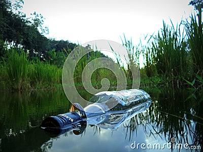 Woter bottle in the river Stock Photo