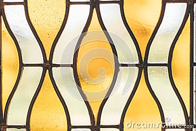 image of yellow-white stained glass window Stock Photo