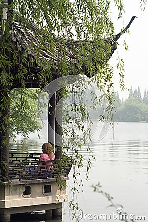 Image of young women relaxing at The Xihu lake Stock Photo