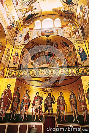 Images of apostles, angels and biblical scenes on the walls and vaults of the Church of the Resurrection of Christ in Editorial Stock Photo