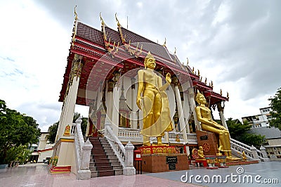 Images of a Walking Buddha and Seated Buddha at Wat Sitaram, a Thai monastery in Bangkok, Thailand Editorial Stock Photo