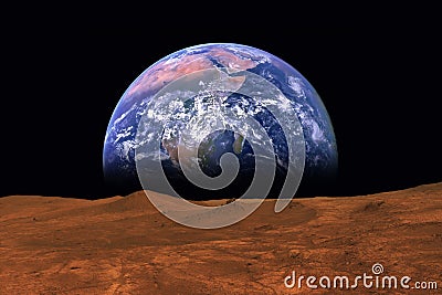 Imaginary view of earth rising from the horizon of plant Mars Stock Photo