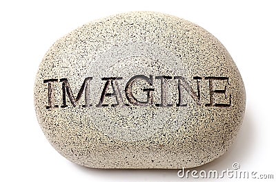 Imagine engraved on a rock. Stock Photo