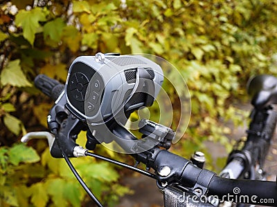 Portable Bluetooth speaker mounted on the bike, for listening to music and radio Editorial Stock Photo