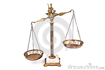 Imbalanced scale between income and taxes Stock Photo