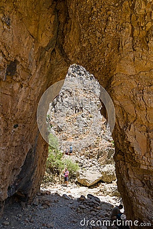 IMBROS GORGE, CRETE - 23 JULY 2021: Hikers exploring the narrow canyons and terrain of the Imbros Gorge in central Crete, Greece Editorial Stock Photo