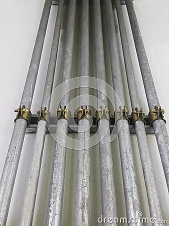 IMC conduit of electricity line on cement wall Stock Photo