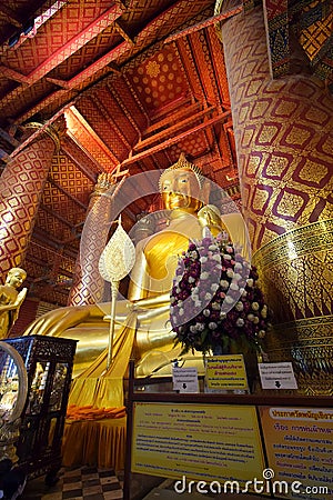 Immense 19m tall gilded seated Buddha image at Wat Phanan Choeng, a historical and culturally important Buddhist temple, Ayutthaya Stock Photo