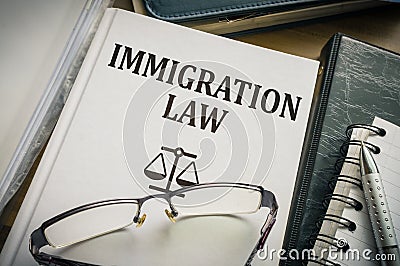Immigration law book. Legislation and justice concept Stock Photo