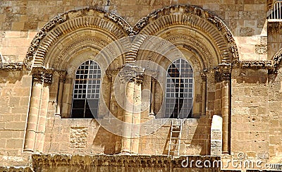 The Immovable Ladder under the window of the Church of the Holy Sepulchre in the Old City of Jerusalem Stock Photo