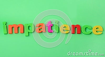 Impatience word on background Stock Photo