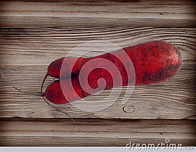 Imperfect fresh organic funny ugly carrot on wooden background Stock Photo