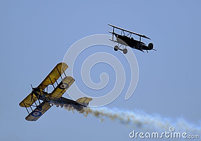 Imperial War Museum. Duxford, Cambridgeshire, UK. 2019 Battle of Britain air show. BE2c under fire from a Fokker DR1 Editorial Stock Photo