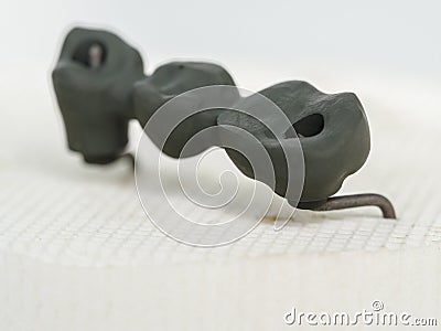 Implants teeth made in the technic Oxidized metal dental Stock Photo