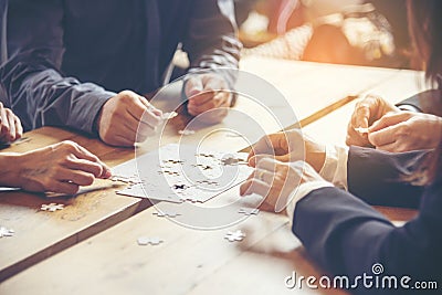 Implement improve puzzel solve connections together with synergy strategy team building organizing connection by trust Stock Photo