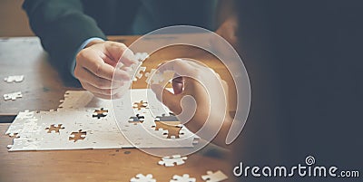 Implement improve puzzel solve connections together with synergy strategy team building organizing connection by trust Stock Photo